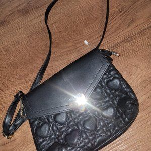 Small black heart embossed  purse with heart clasp